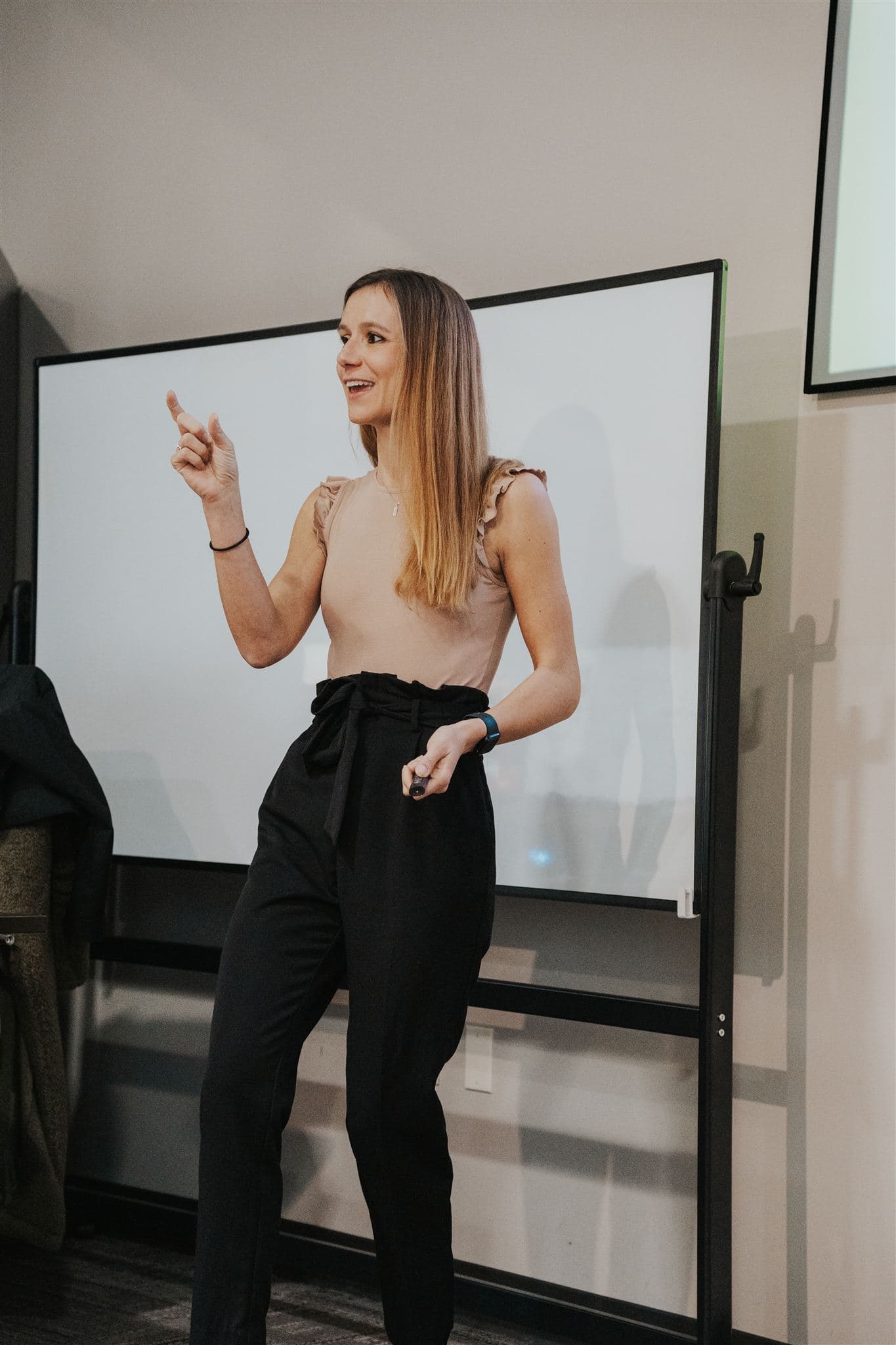 Emma teaching a session, mid-gesture